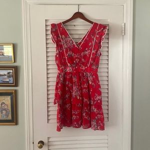 Adorable summer dress! Ruffed sleeves, covered buttons and tiered skirt!